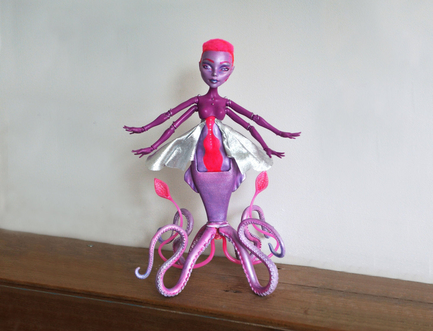 Alien squid art doll in pink and purple sunset colour scheme - beautiful sea monster figure for fans of science fiction