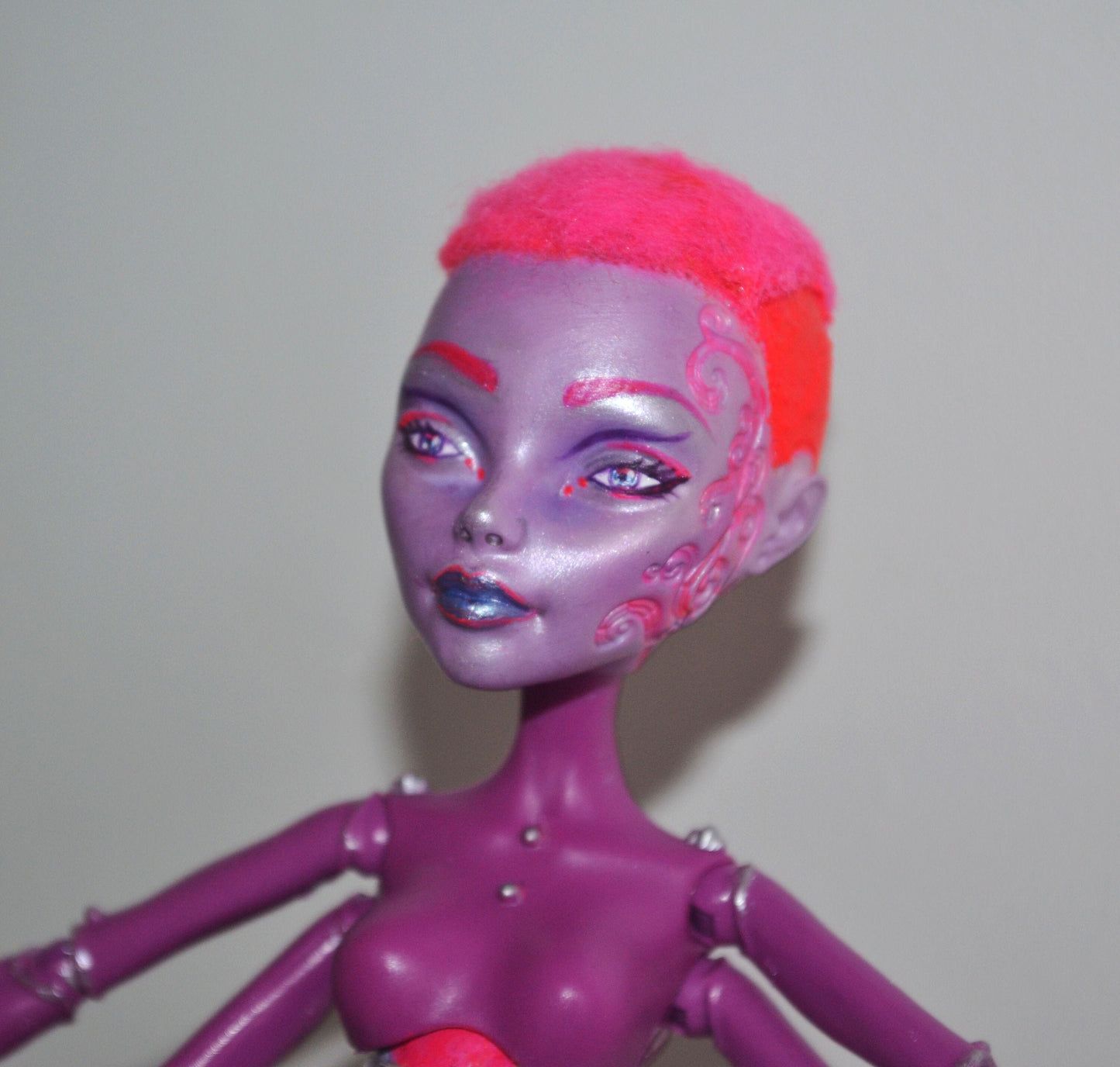 Alien squid art doll in pink and purple sunset colour scheme - beautiful sea monster figure for fans of science fiction