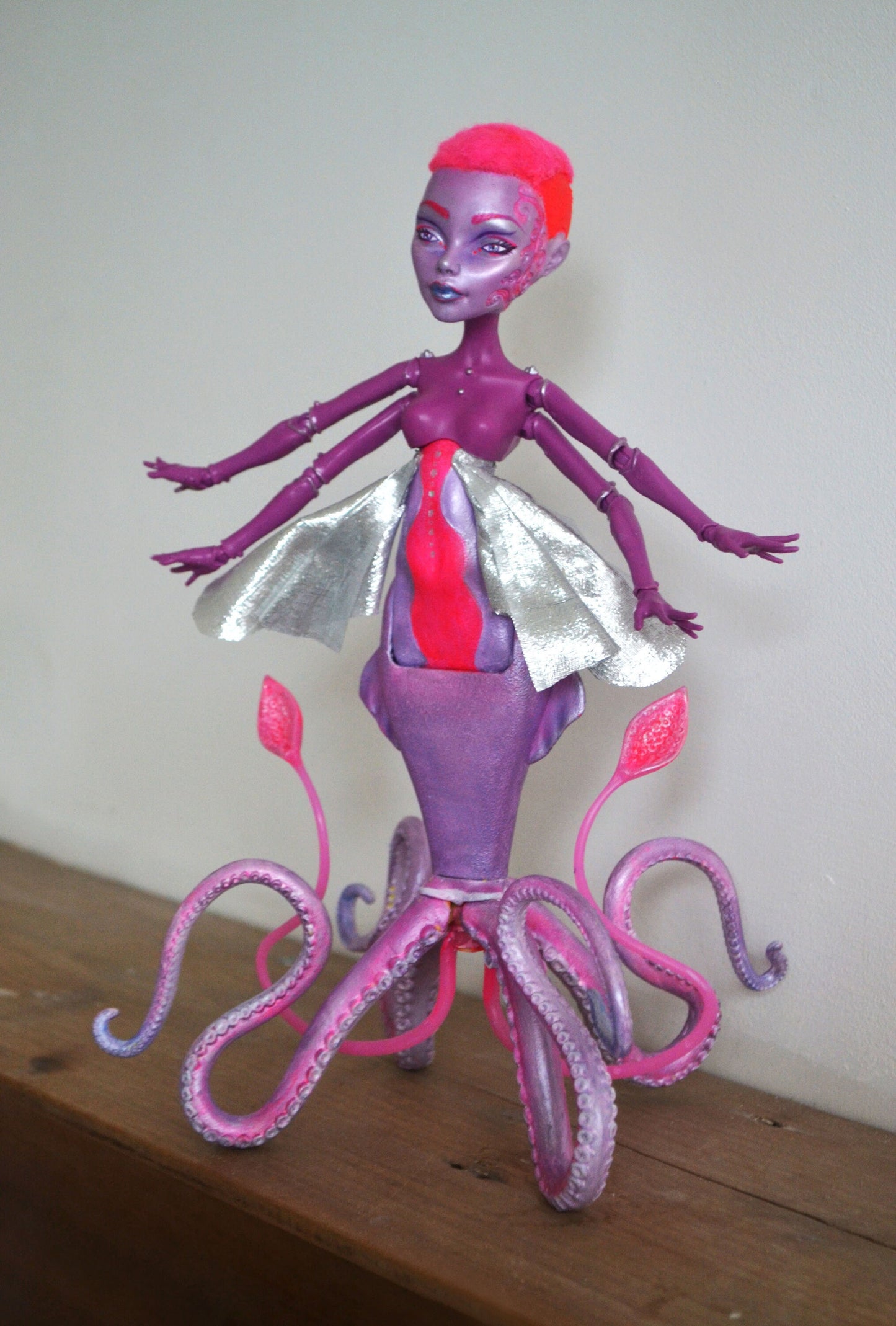 Alien squid art doll in pink and purple sunset colour scheme - beautiful sea monster figure for fans of science fiction