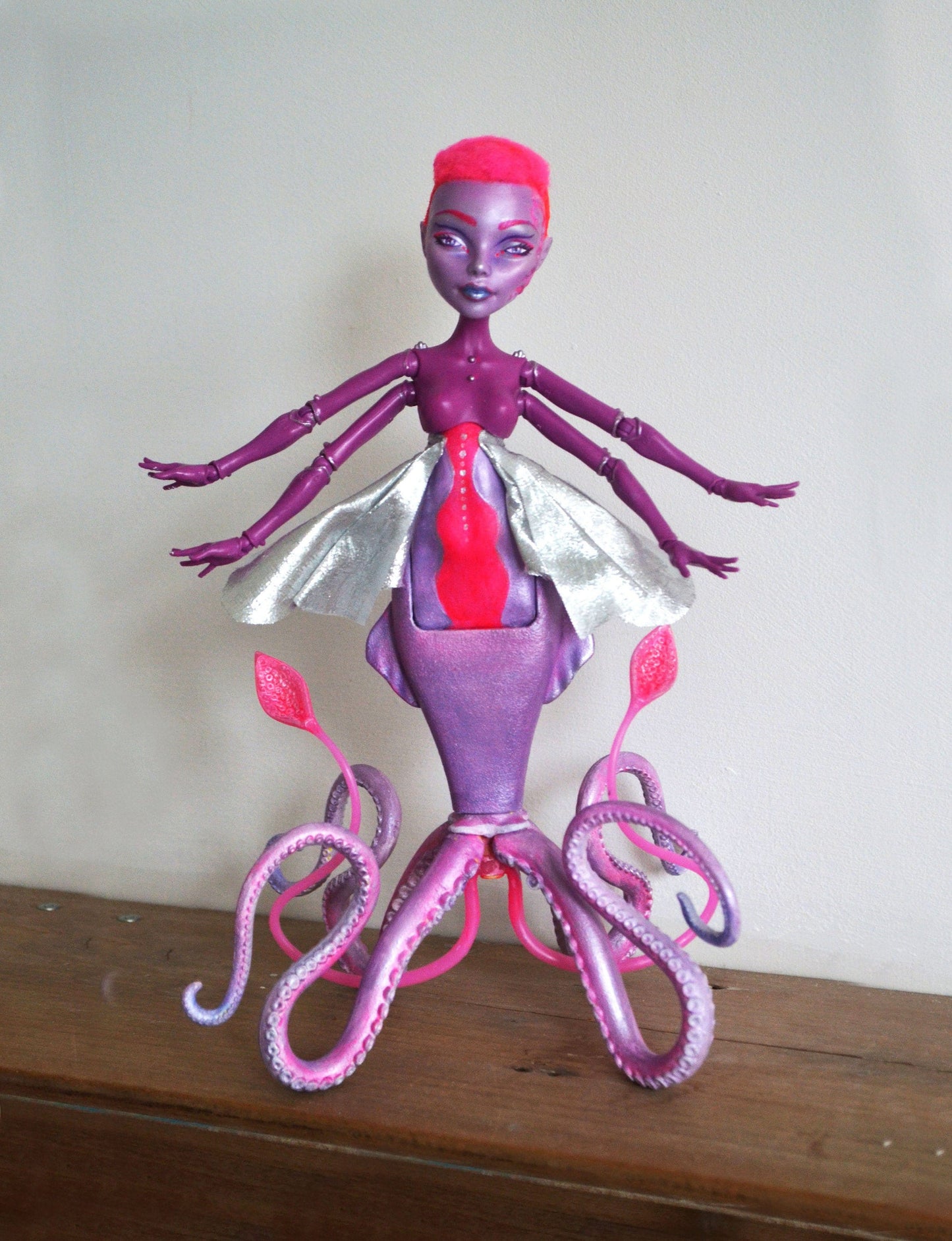 Alien squid art doll in pink and purple sunset colour scheme - beautiful sea monster figure for fans of science fiction