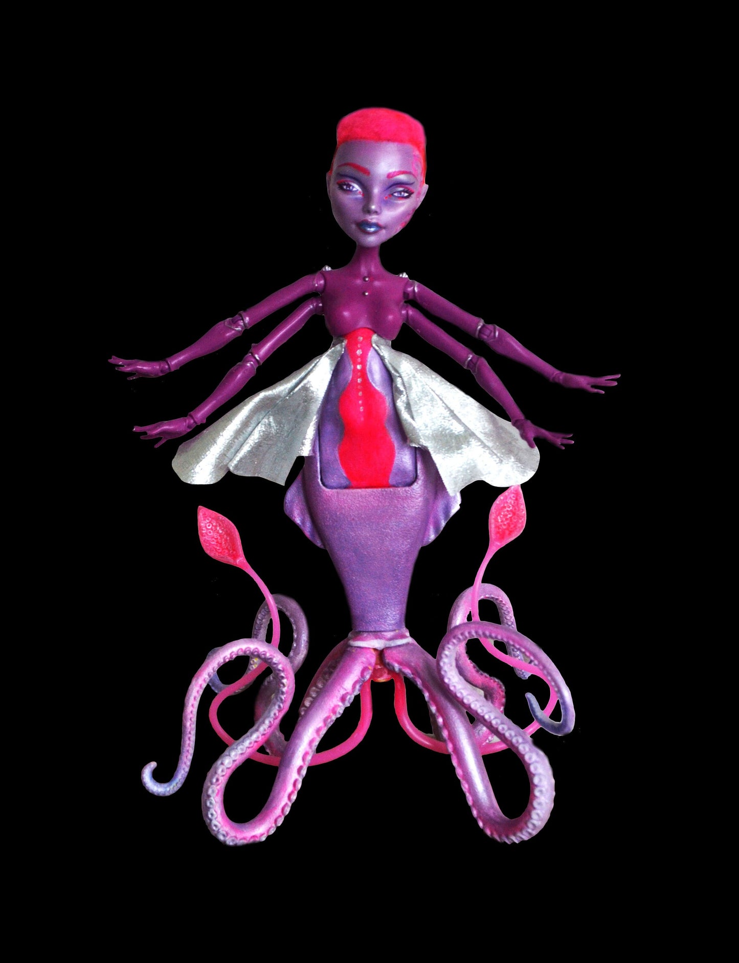 Alien squid art doll in pink and purple sunset colour scheme - beautiful sea monster figure for fans of science fiction