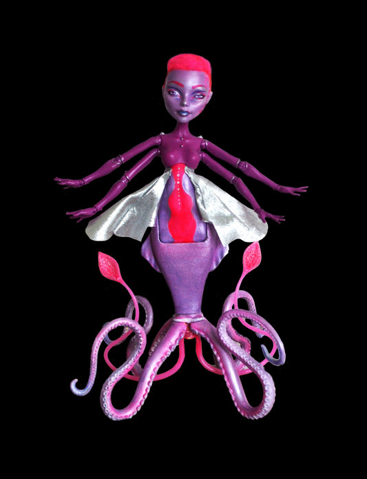 Alien squid art doll in pink and purple sunset colour scheme - beautiful sea monster figure for fans of science fiction